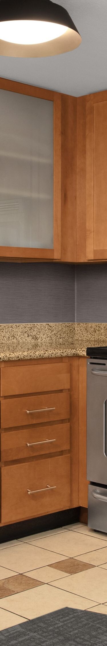 Large kitchen with appliances, cabinets and table