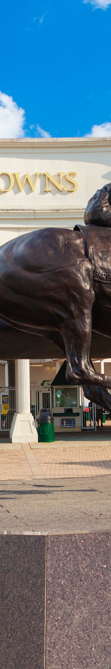 Exterior of Churchill Downs with statute