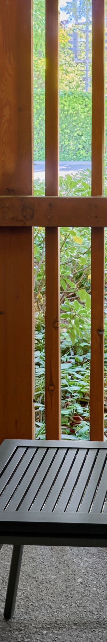 Fenced in patio with seating
