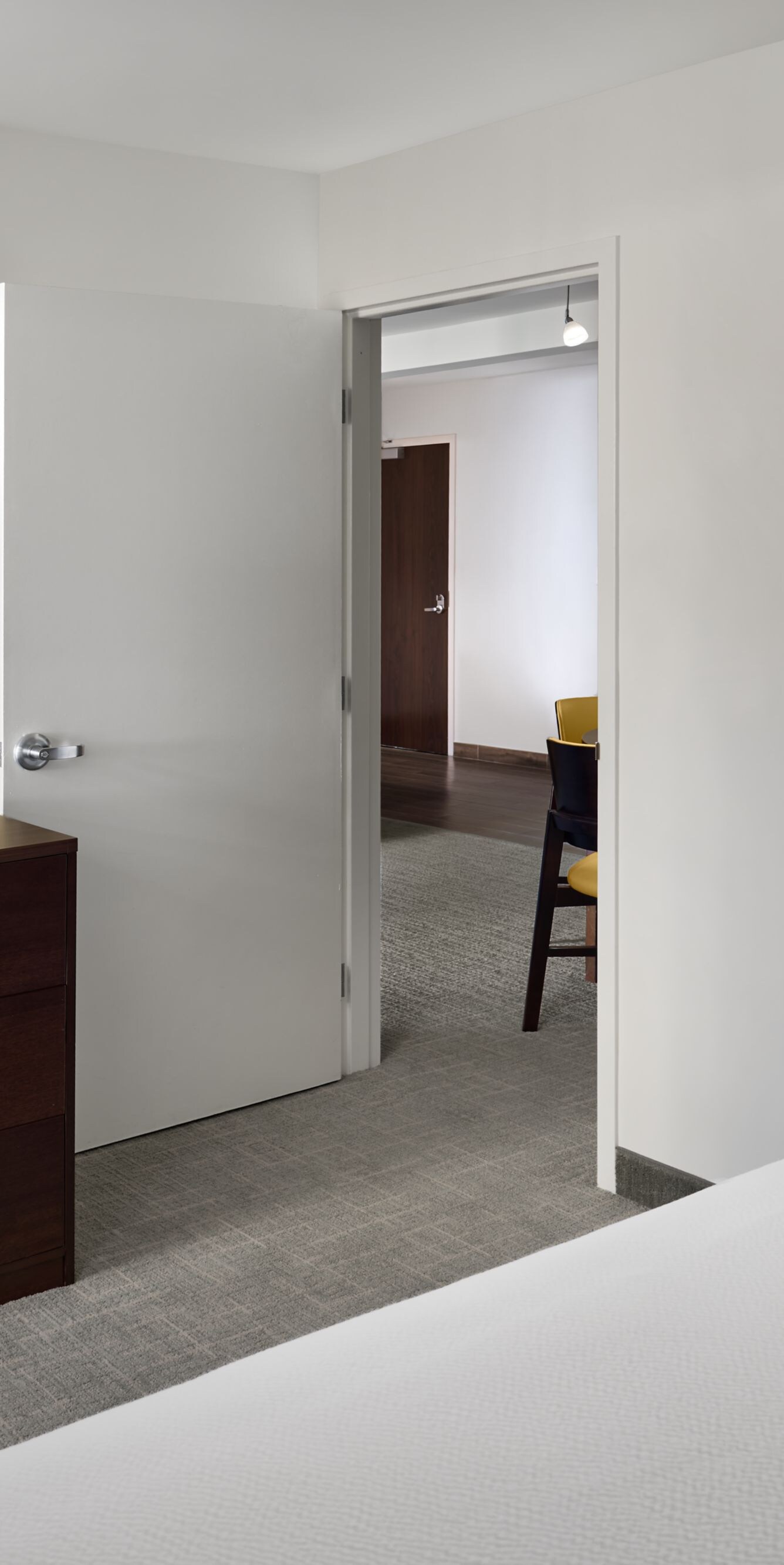 Bedroom door open to living room
