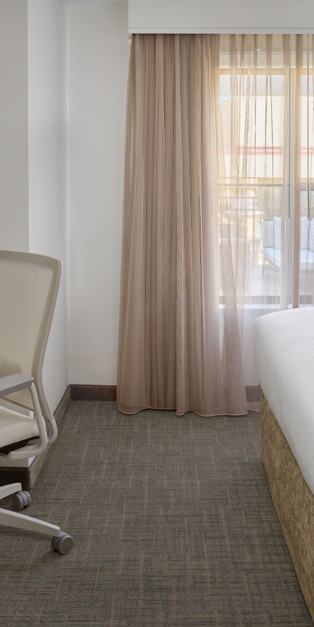 Workspace and bed in bedroom