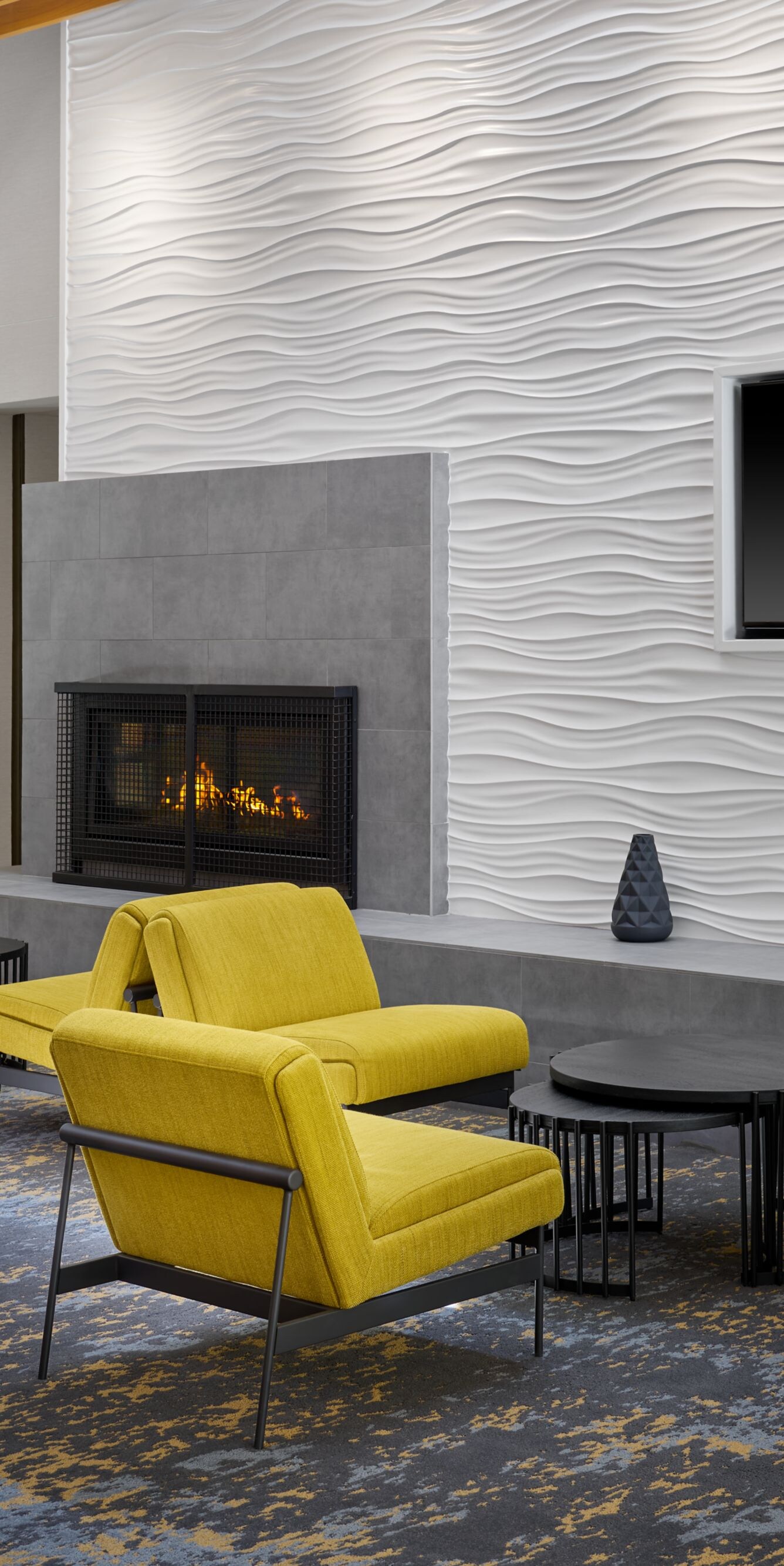 Modern lobby seating with fireplace