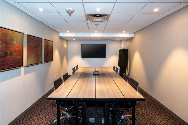 Long table in Meeting Room with monitor