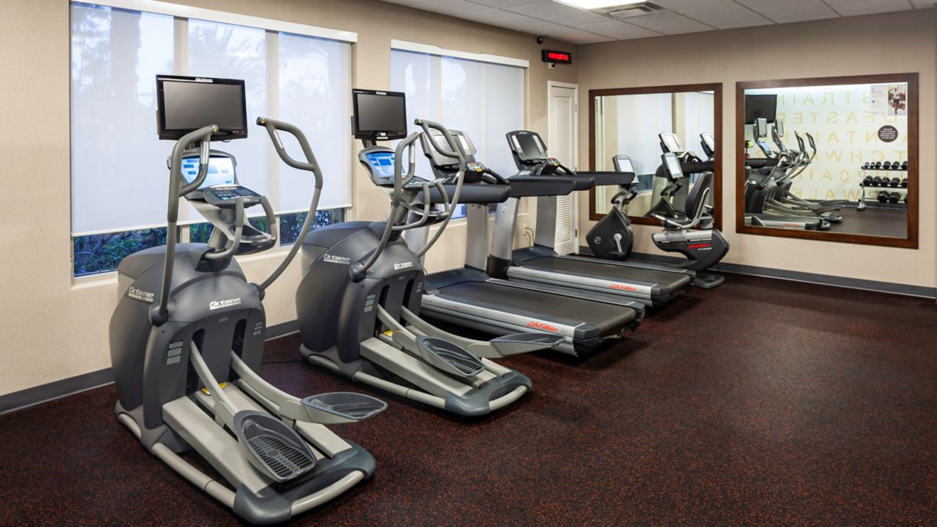 Fitness Center equipped with treadmills.