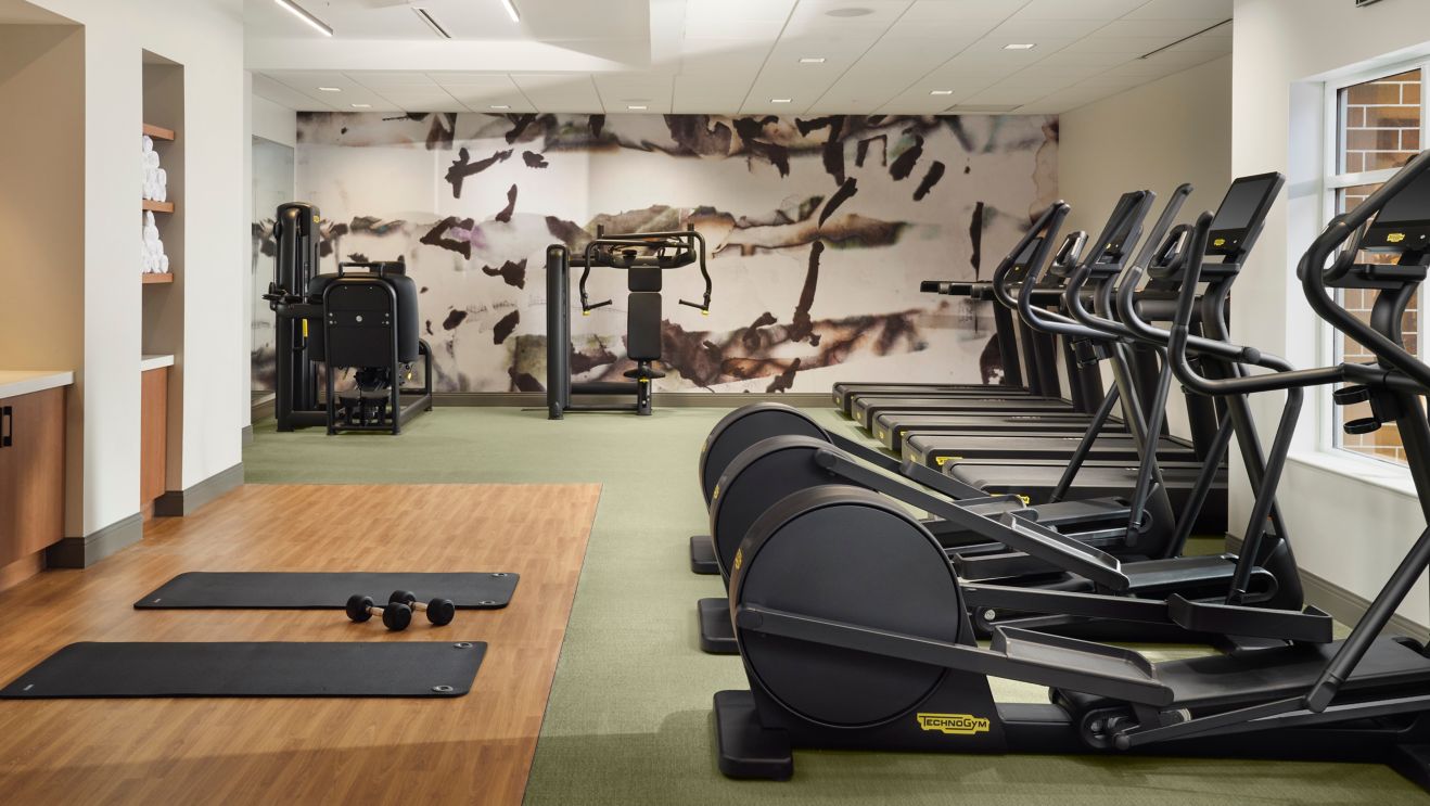 fitness center with aerobic and strength equipment