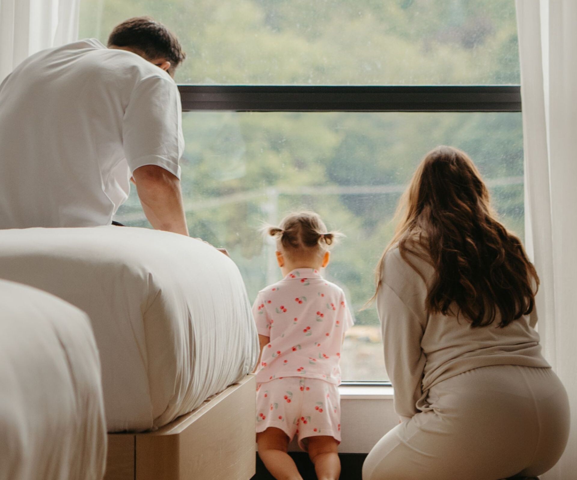 Family enjoying hotel room