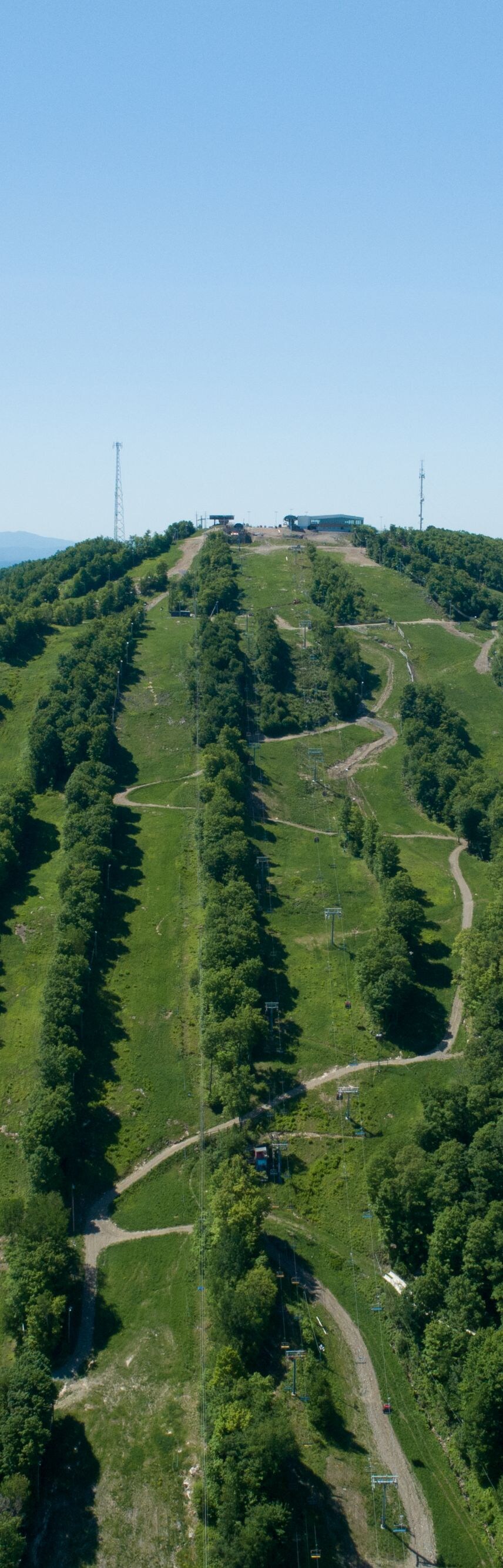 Aerial view of green mountain trails,