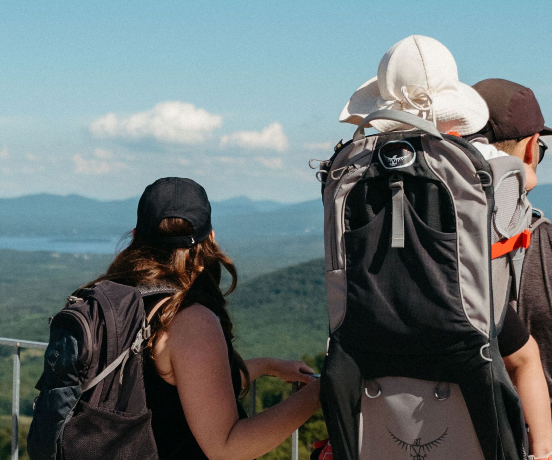 Family overlooking mountain scenery