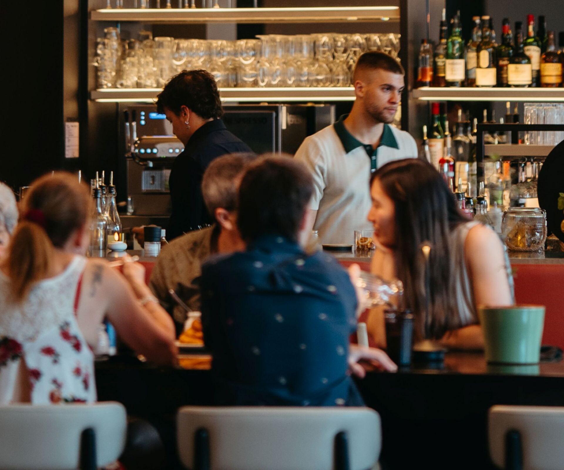 Guests dining inside restaurant