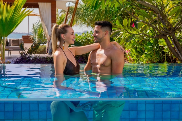 Couple enjoying in the villa private pool