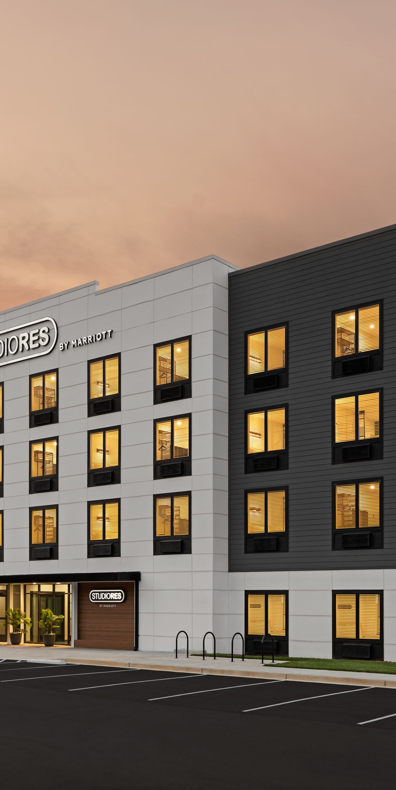 Exterior of hotel at dusk
