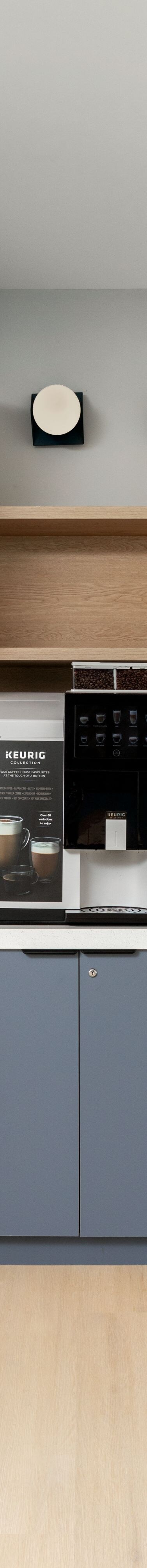 Shared coffee station with cabinets and counter