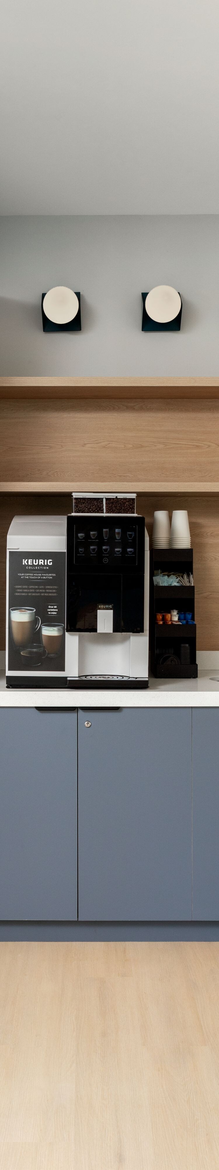 Shared coffee station with cabinets and counter