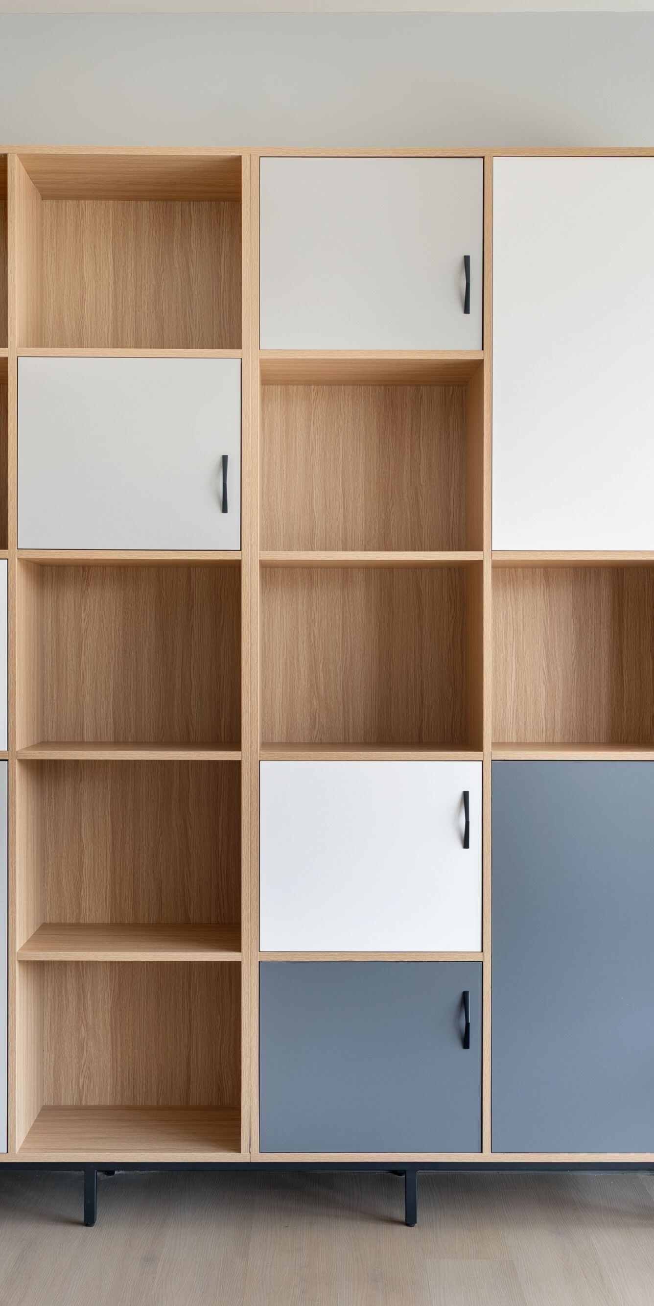 Package delivery station with storage shelves