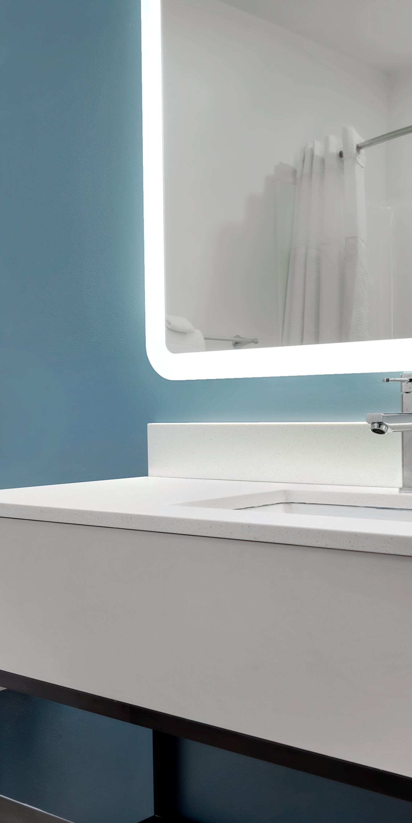 bathroom vanity and bathtub