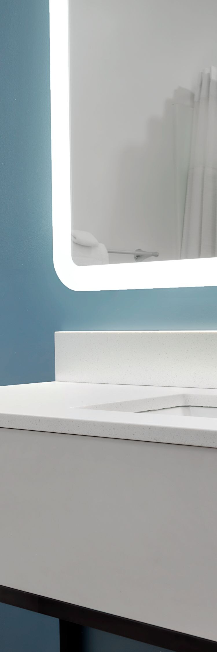 bathroom vanity and bathtub