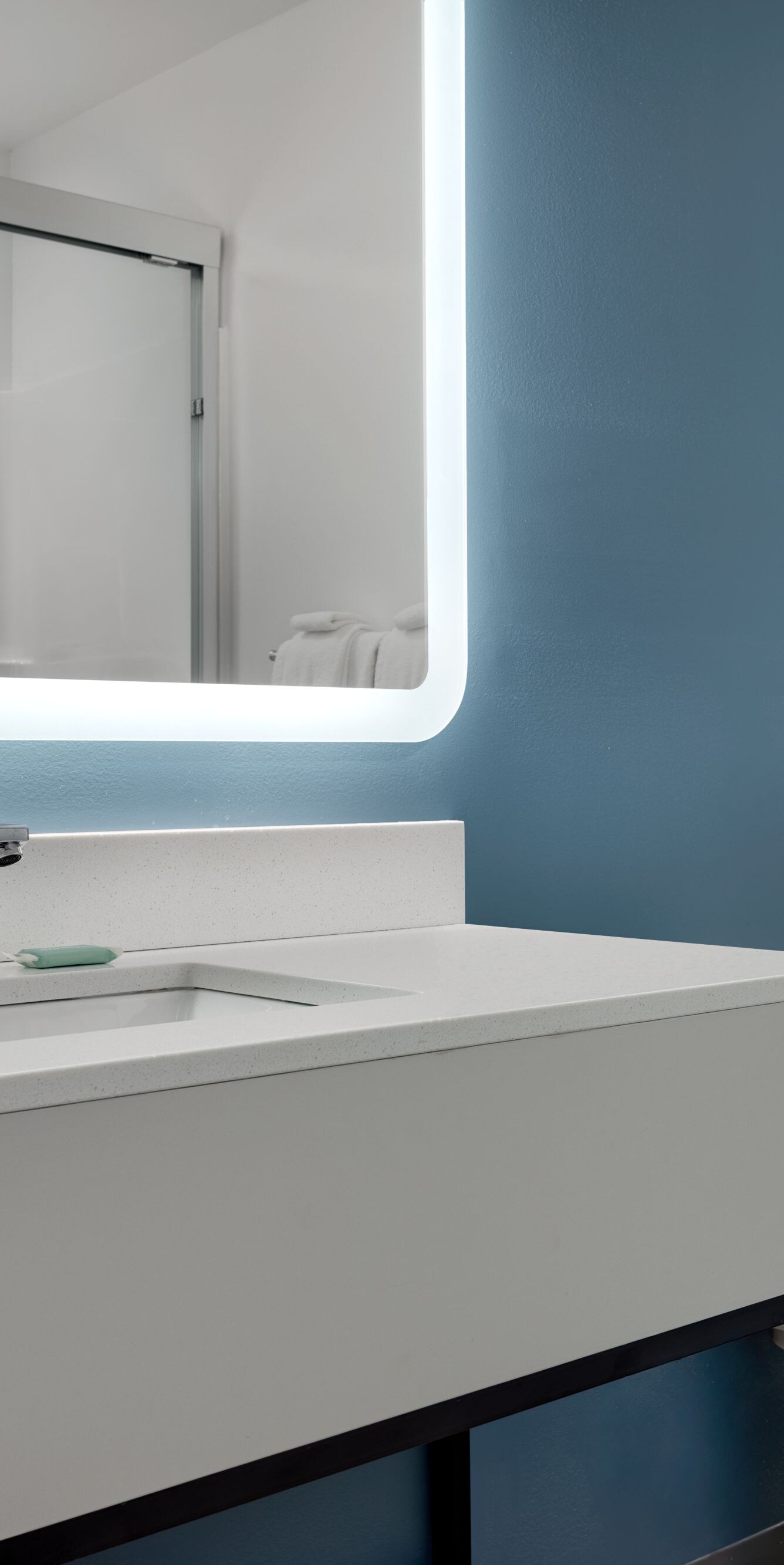 guest room vanity with shower