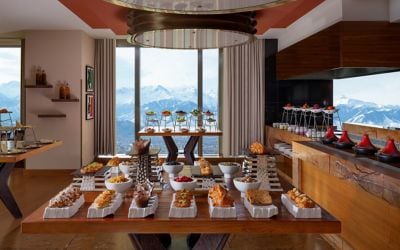 A restaurant with a view towards the mountains.