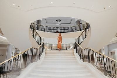 lady on grand staircase