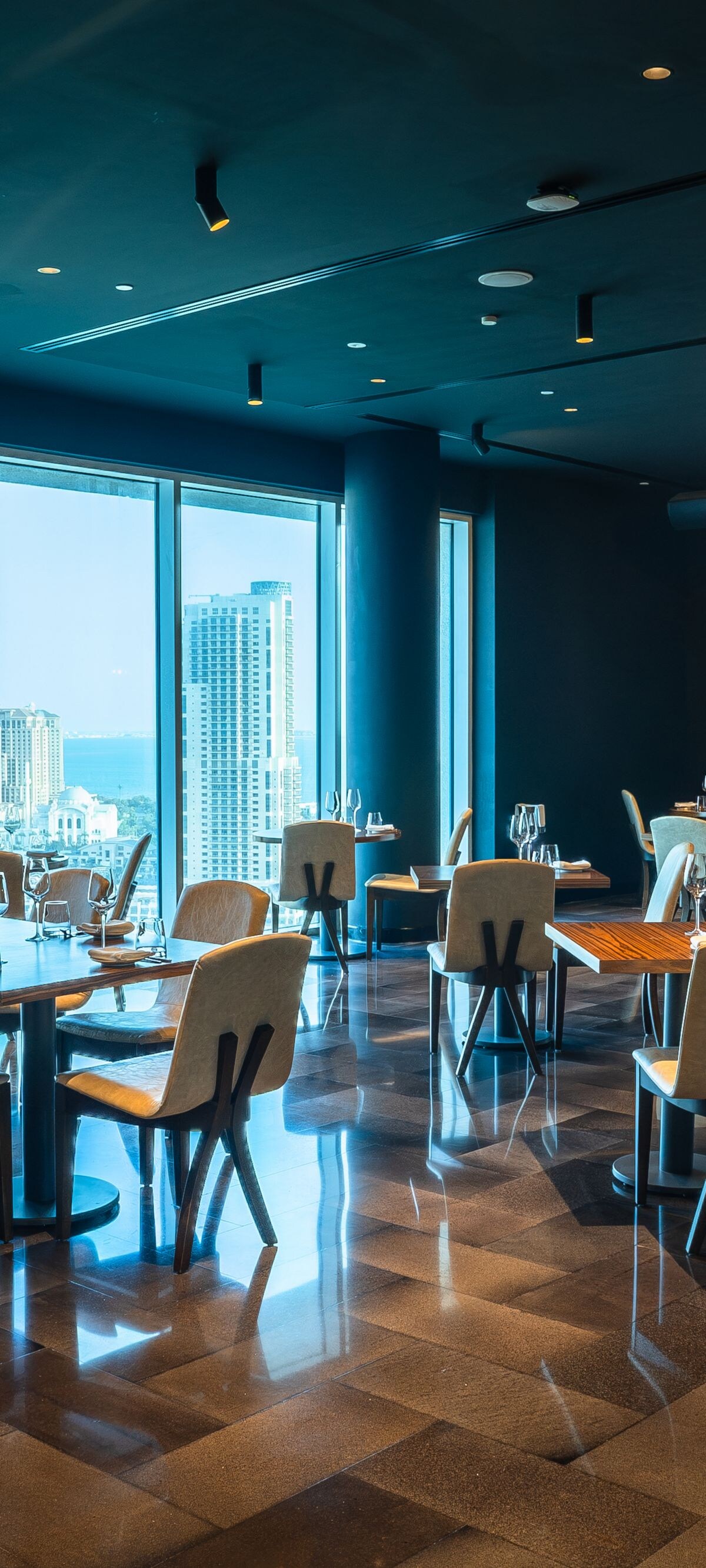 STK interior with stylish seating and city view