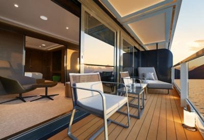 Two lounge chairs on the terrace of a yacht cabin