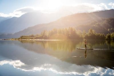 Paddle boarding  on a lake  