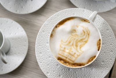 Latte with custom Ritz-Carlton foam logo