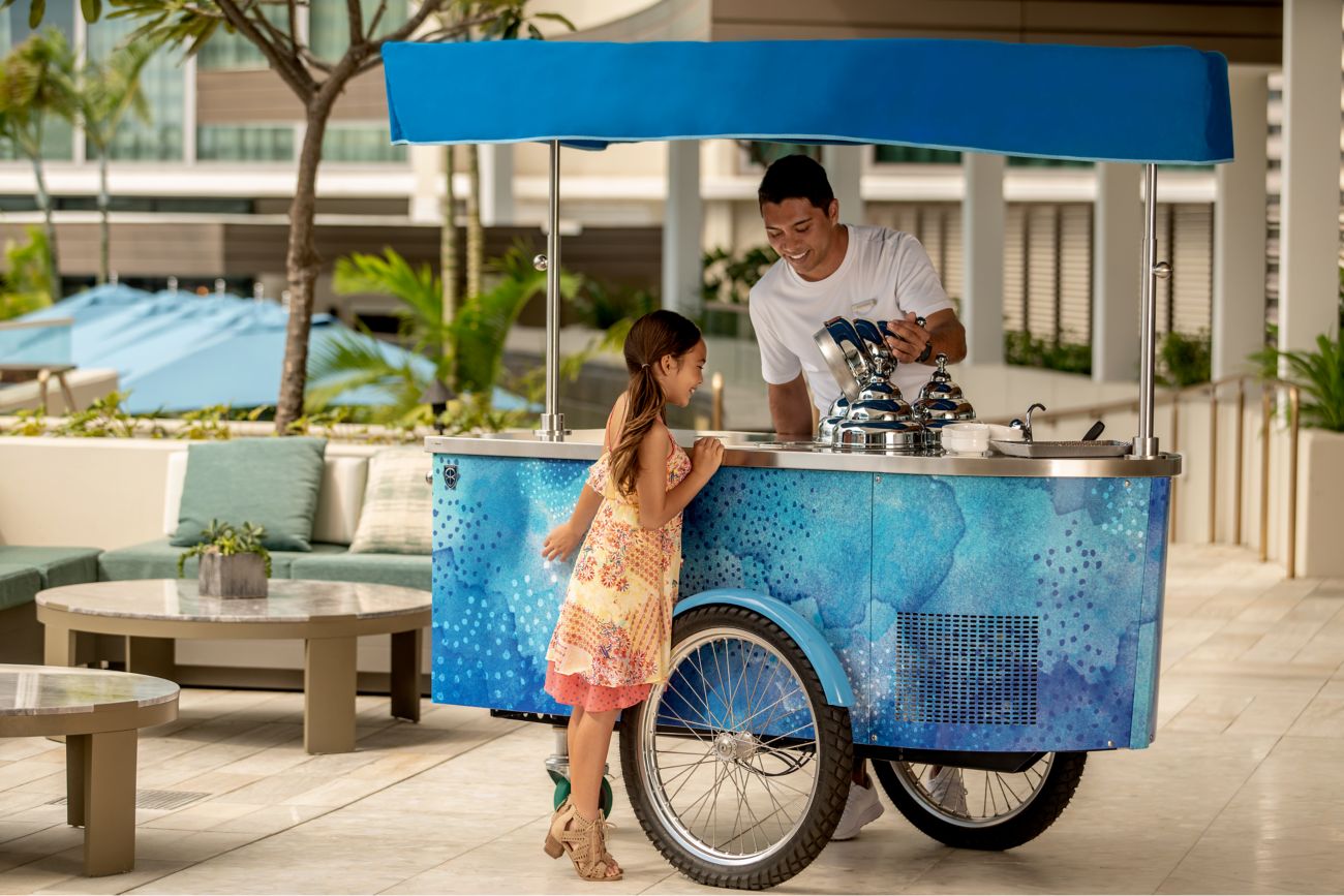Discover Oahu Reimagined through the resort's island snack trolley featuring a rotating menu of Hawaii's flavors.