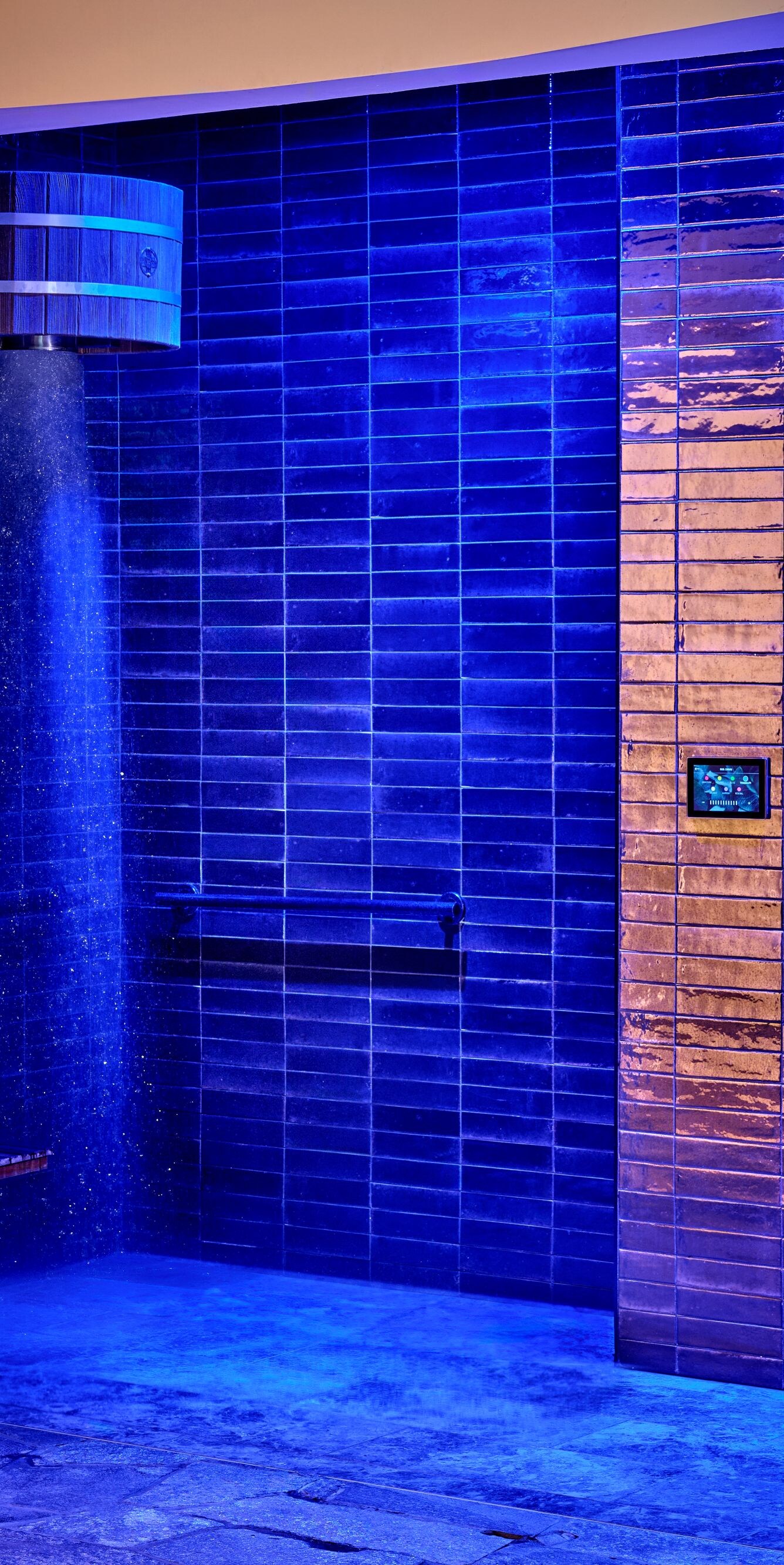 Spa cold plunge pool with blue tile walls