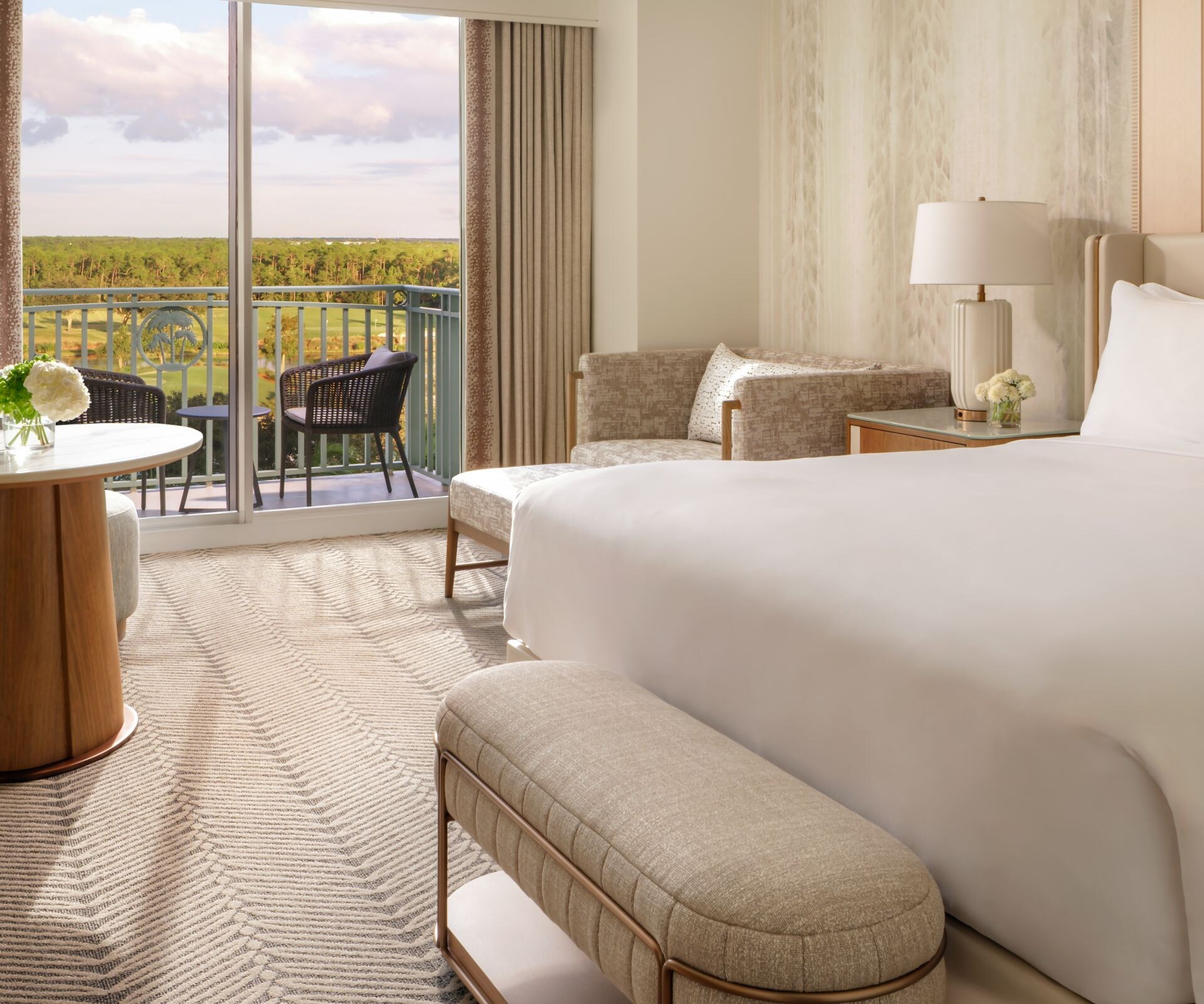 King guest room with balcony and golf view