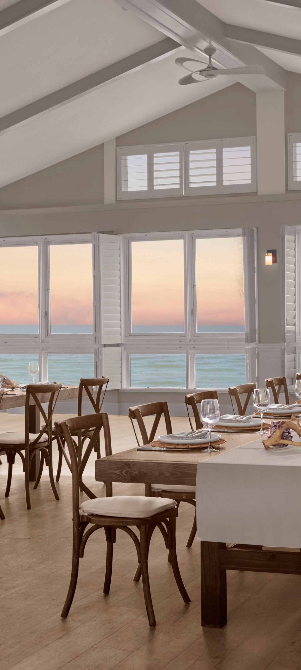 Oceanfront dining room set for formal event