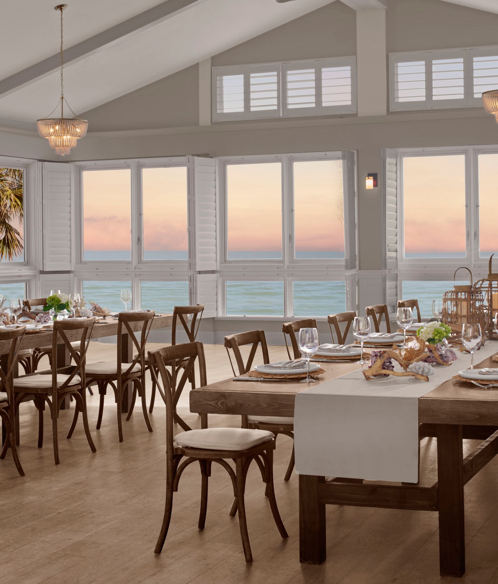 Oceanfront dining room set for formal event