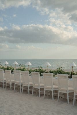 Oceanfront wedding reception setup