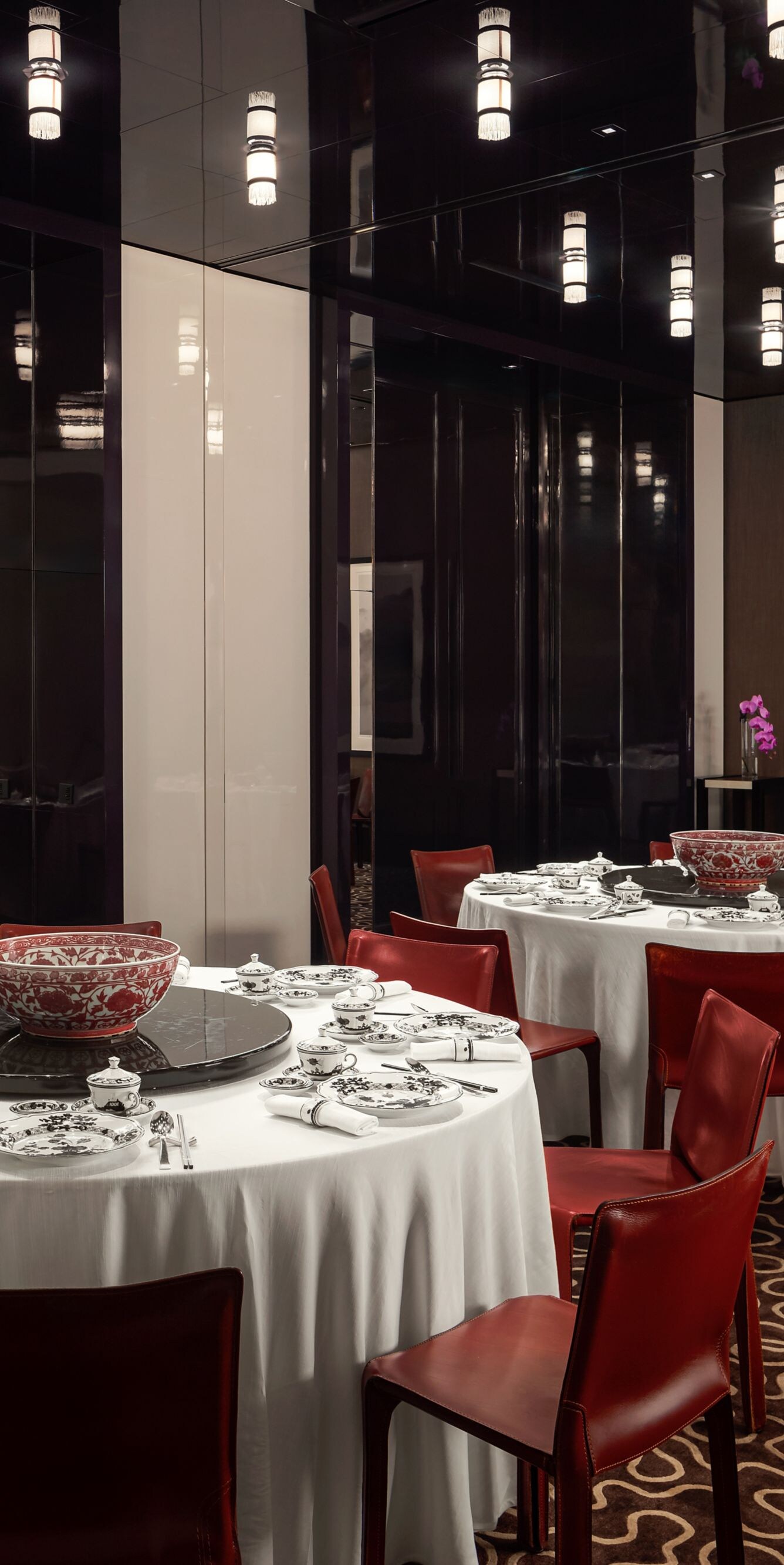 a private dining room with 3 round tables