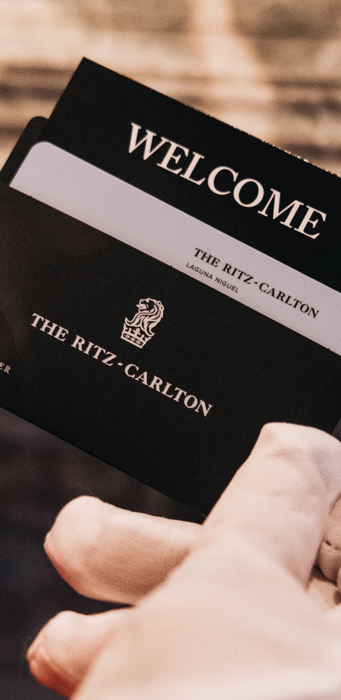 Santa holds a guest room key card to the resort