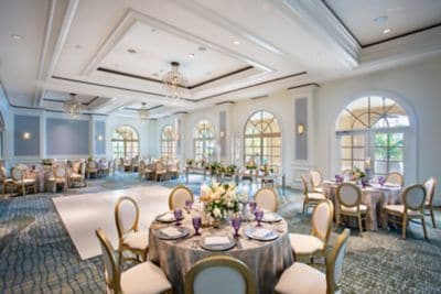 Round tables and dance floor with tablescapes
