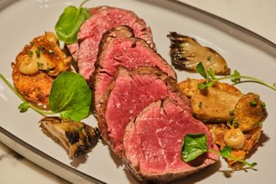 pork, mushrooms, green leaves, accent