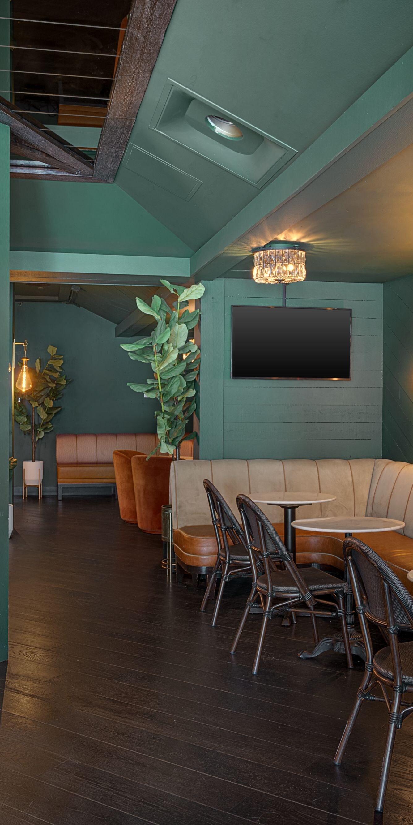 Cozy tavern lounge with booth seating