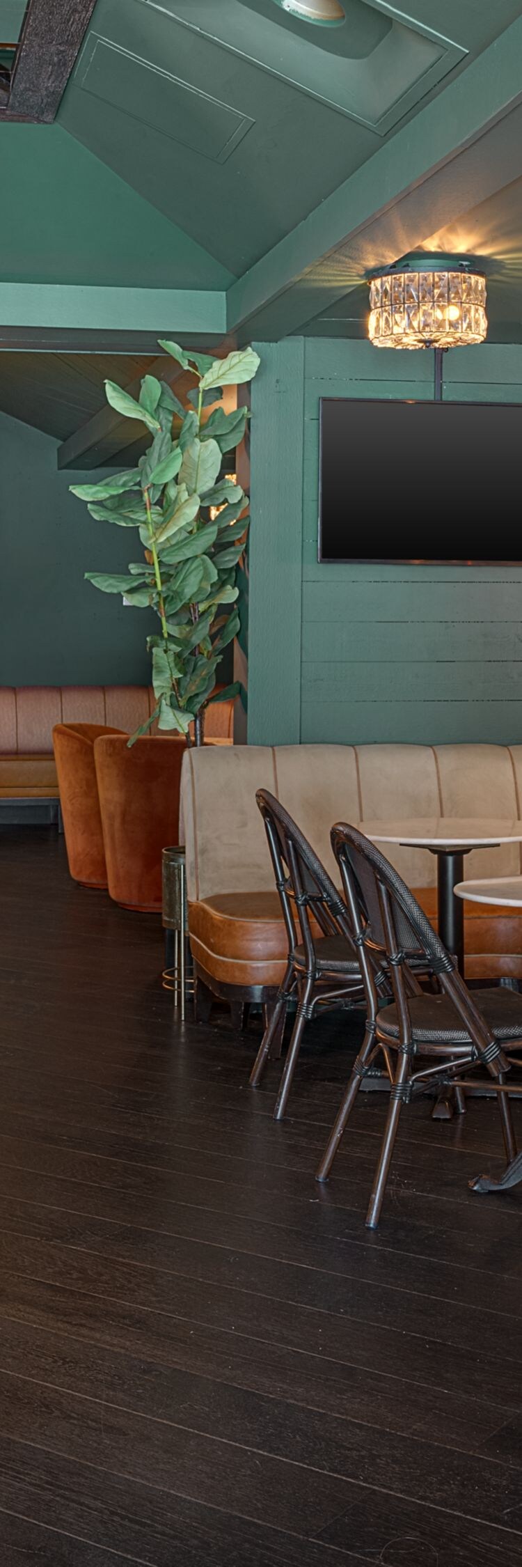 Cozy tavern lounge with booth seating