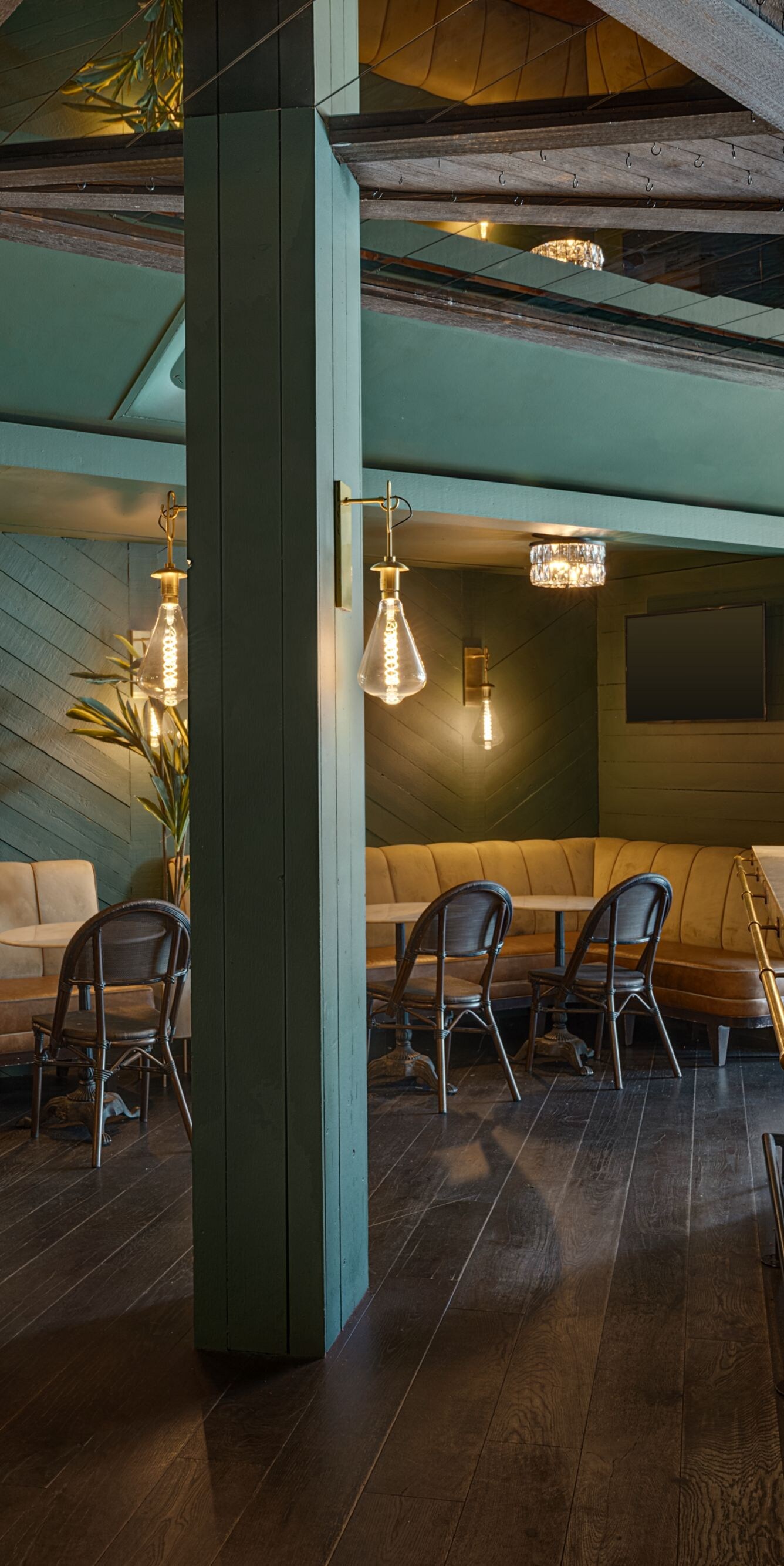 Cozy tavern lounge with booth seating