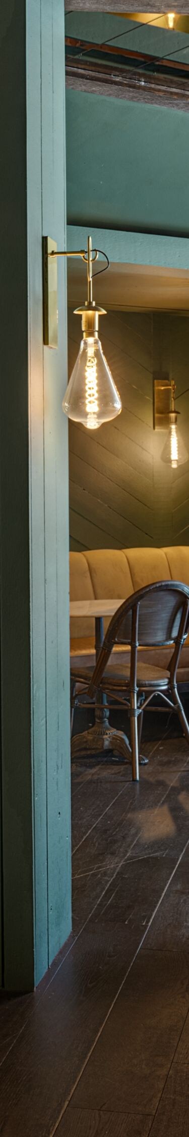 Cozy tavern lounge with booth seating