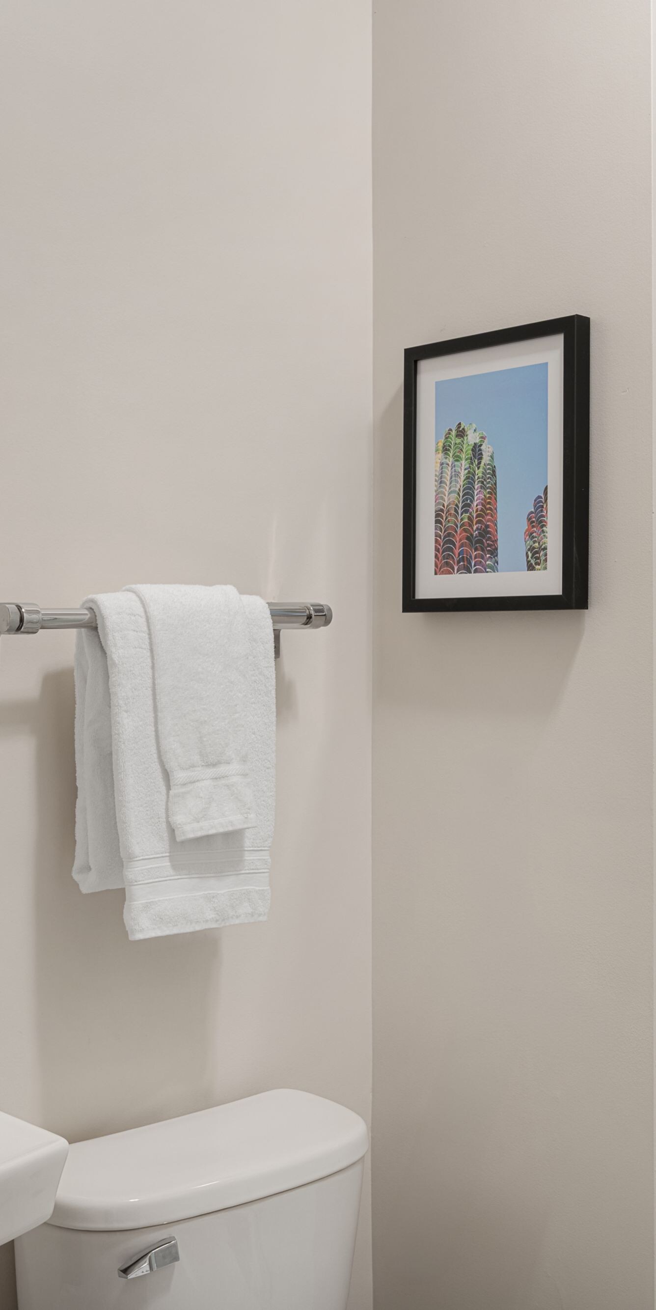 Modern guest bathroom with glass shower enclosure