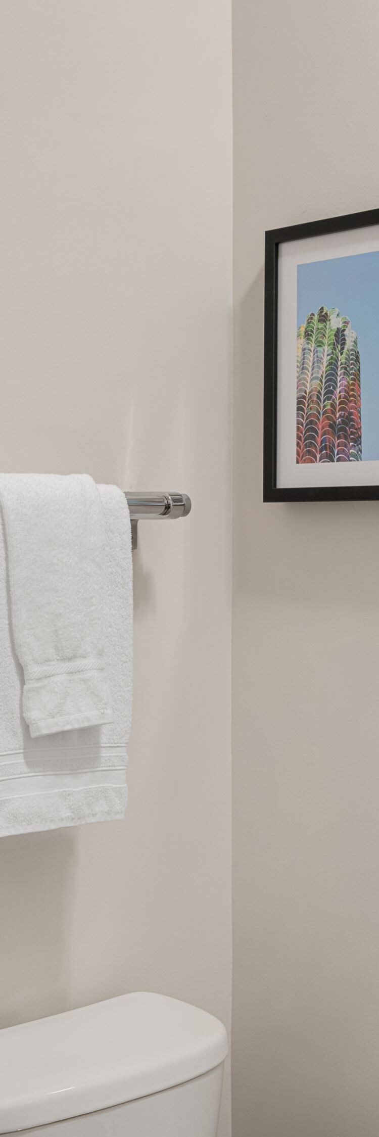 Modern guest bathroom with glass shower enclosure