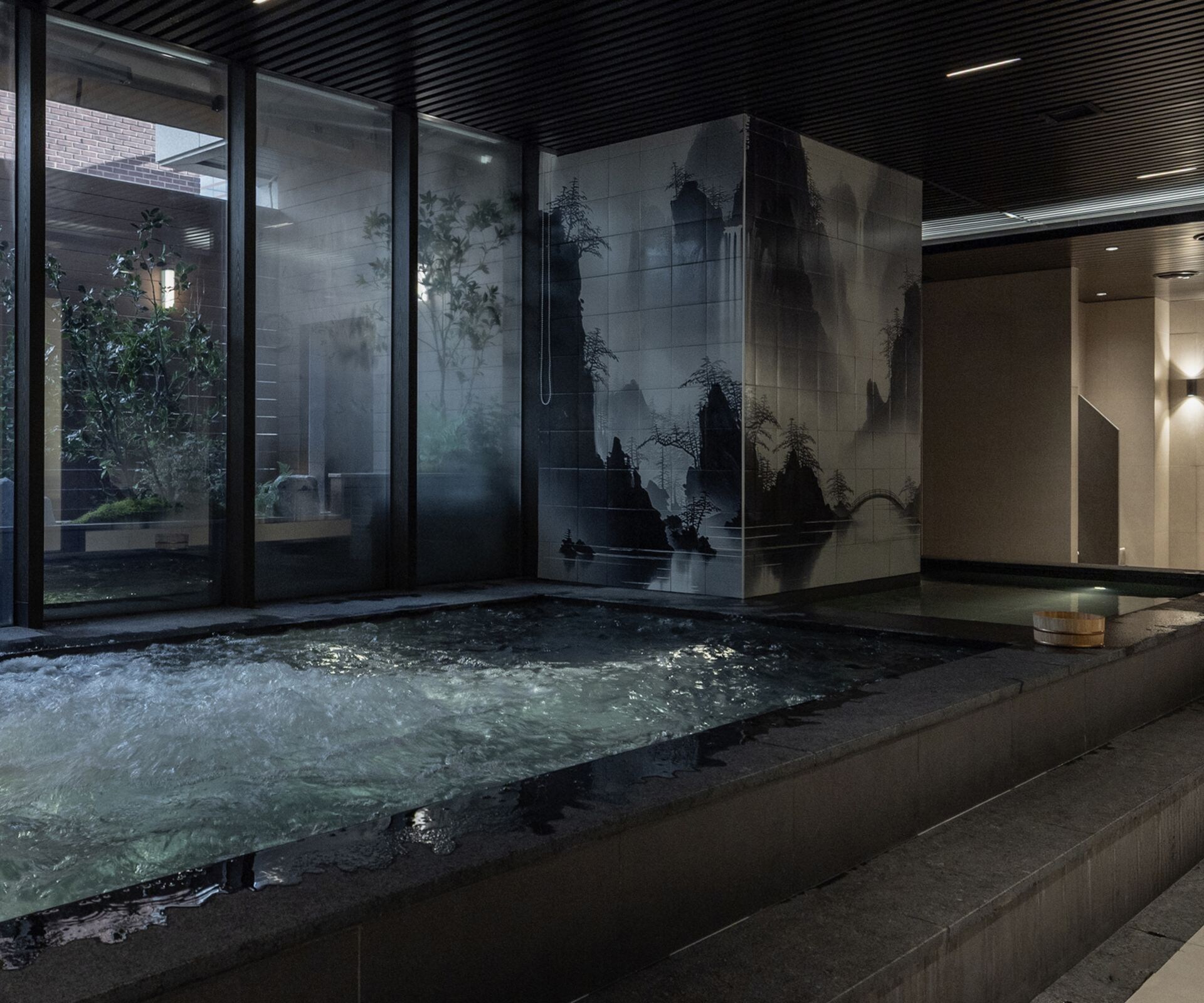 Indoor whirlpool with floor-to-ceiling windows