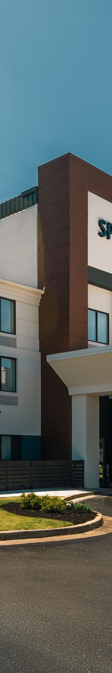 Exterior - Our porte-cochère keeps you dry.