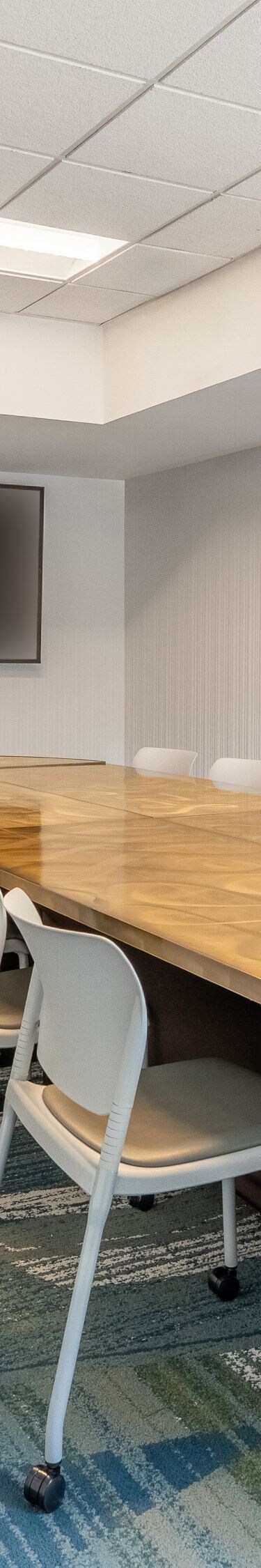 The Owls Boardroom has a TV & white board.