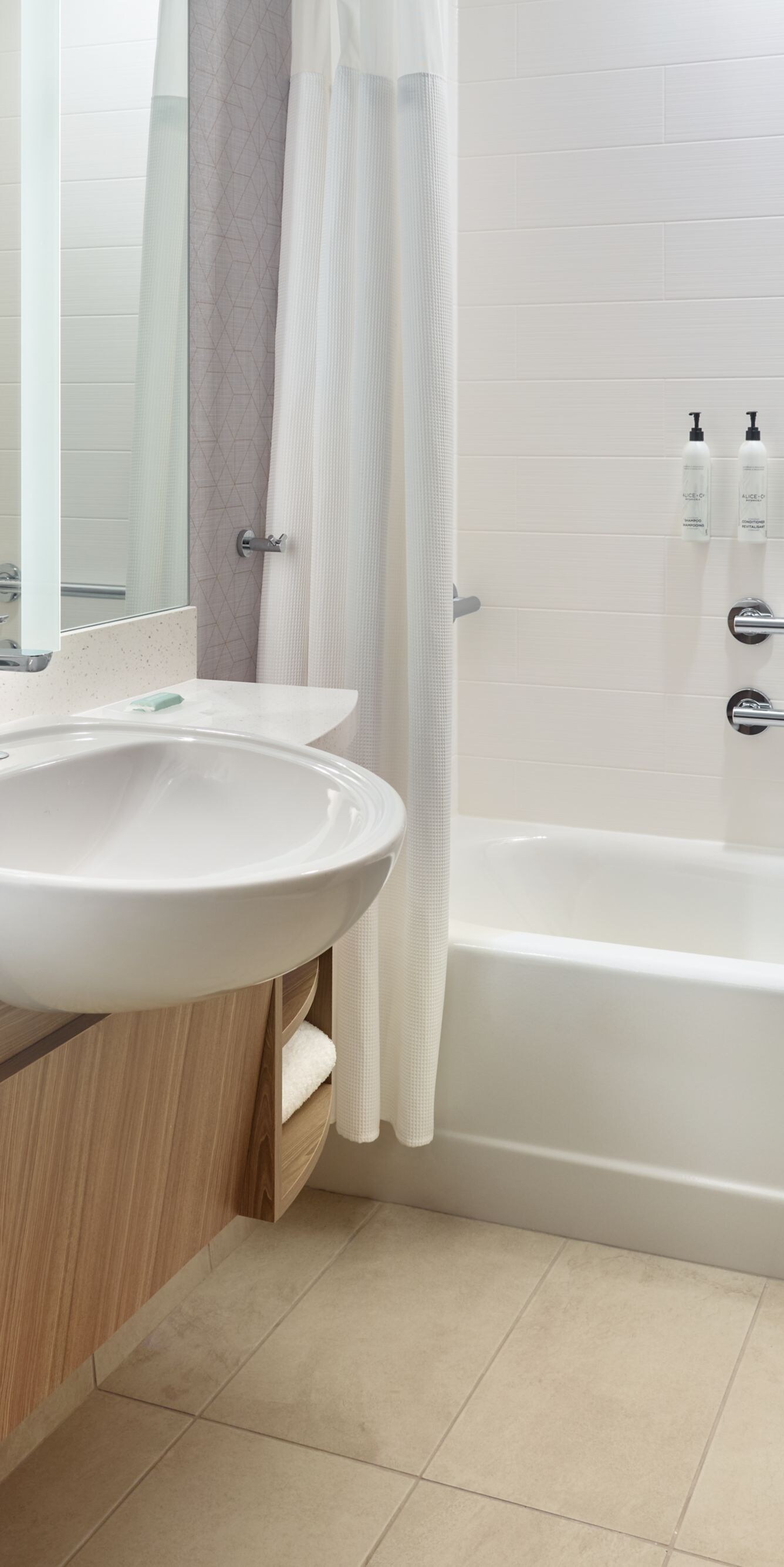 Accessible bathroom with tub and grab bars