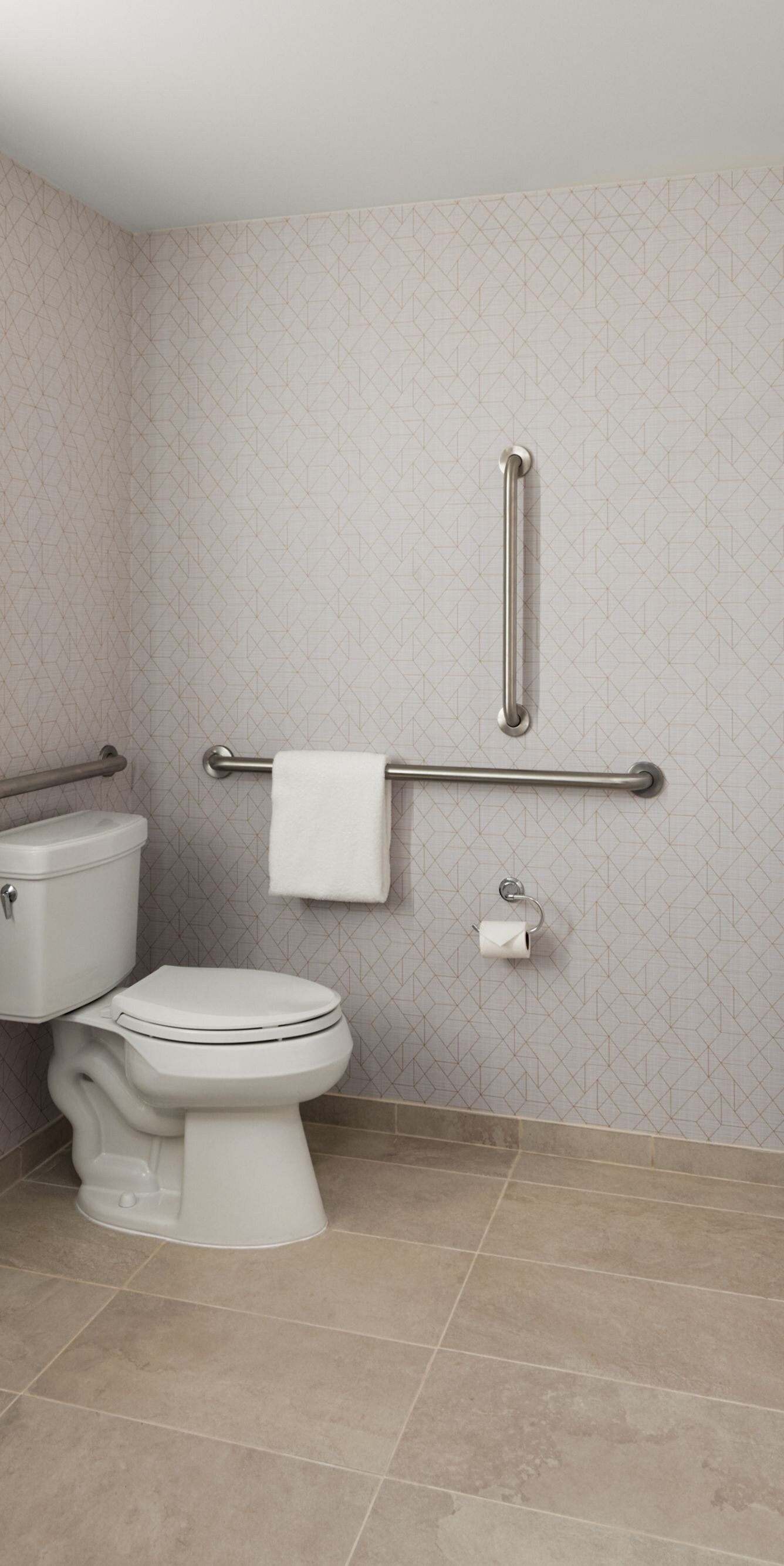 Accessible bathroom with tub and grab bars