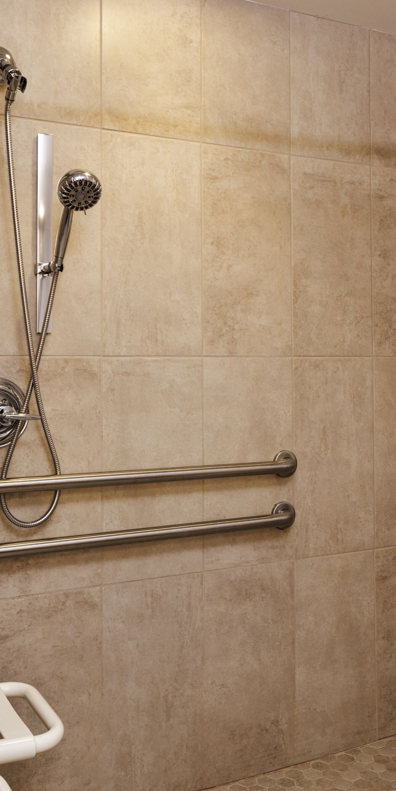 Accessible Roll-in shower with grab bars and seat