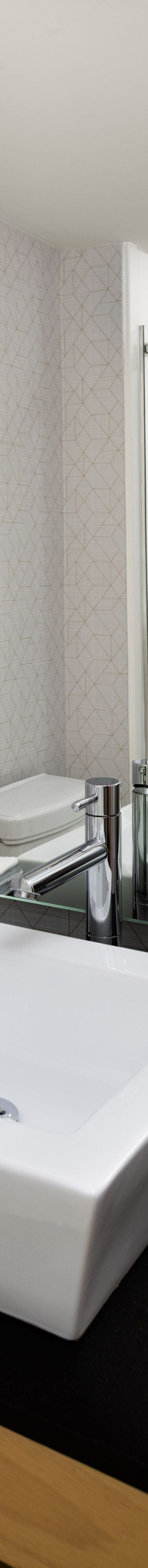 Bathroom with vessel sink and mirror